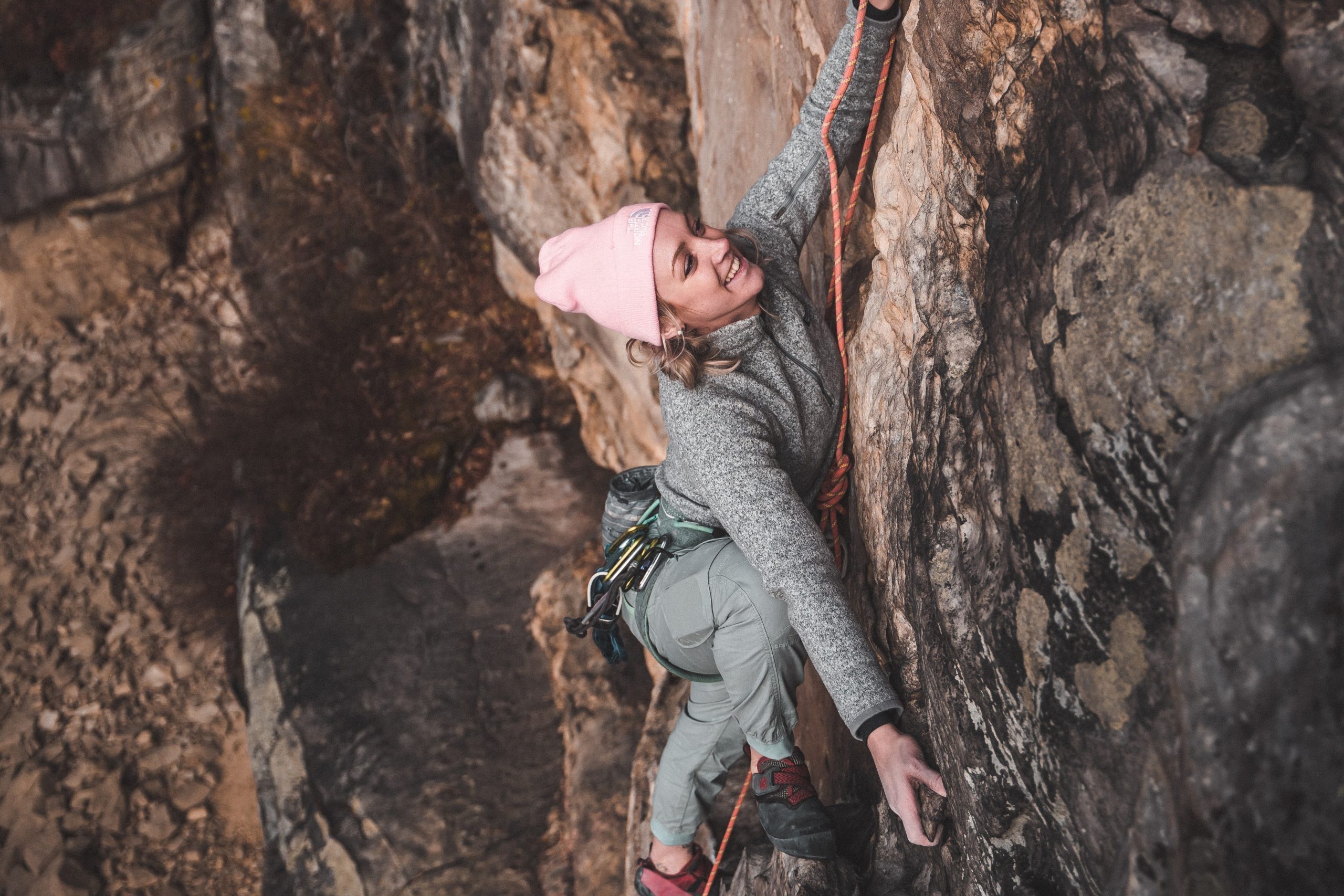 Woman mountain climbing