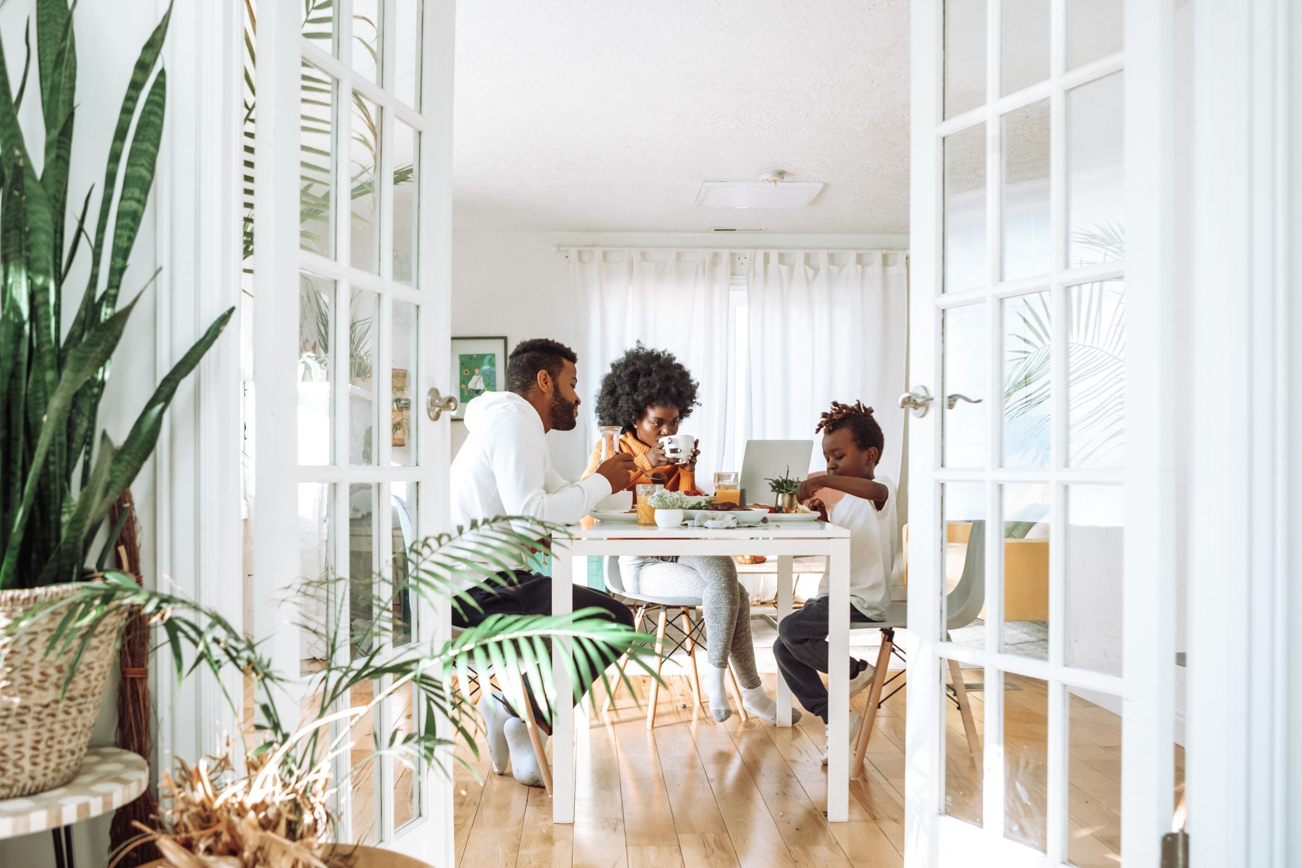 Family eating breakfast together and enjoying their time