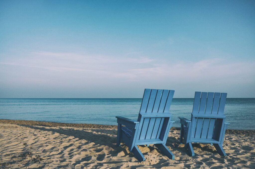 beach chairs near the water